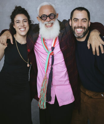 Hari Salem poses with his daughter Tassie and son Lucan in a smiling studio portrait.